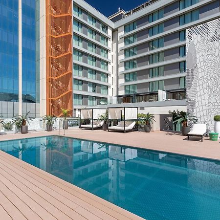Barcelo Imagine Otel Madrid Dış mekan fotoğraf The hotel's rooftop pool